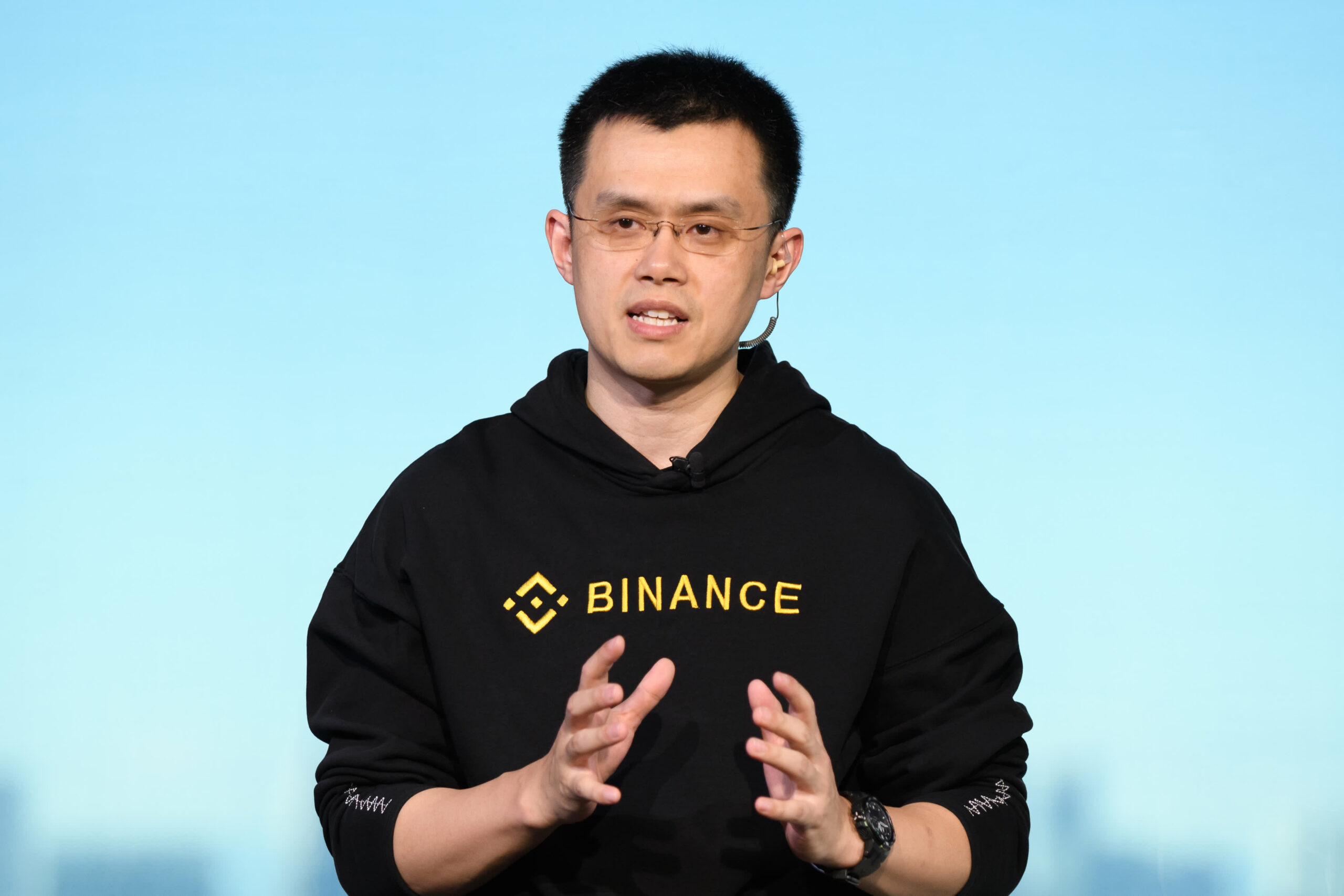 Binance CEO, Changpeng Zhao talking in a conference